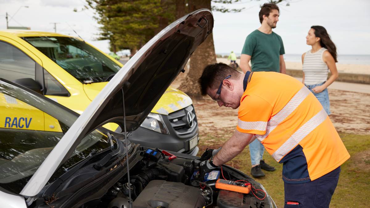 RACV roadside assistance van helping a broken down car