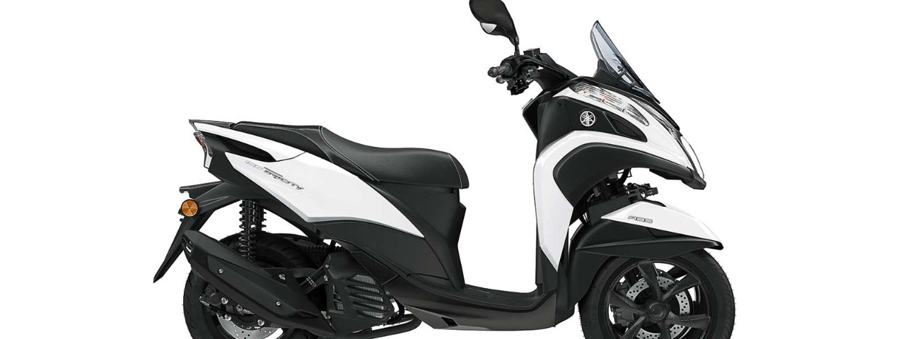 Yamaha scooter on white background.