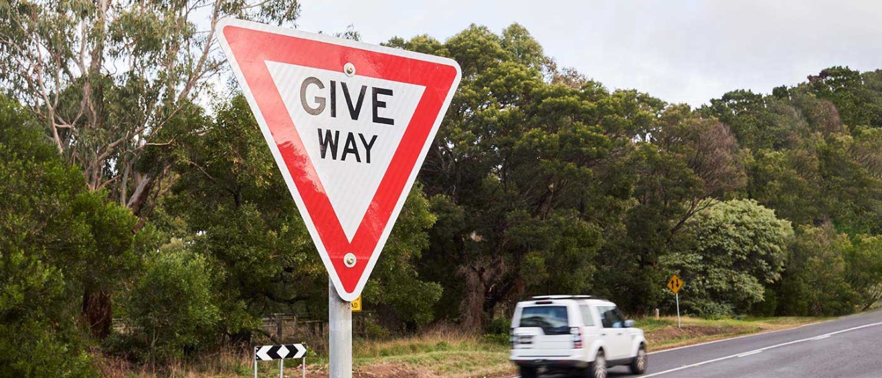 Give-way-sign-Matt-Harvey-1218-banner.jpg Car driving past give way sign on country road