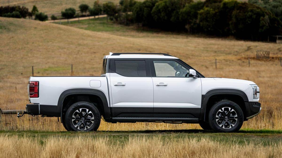 white 2025 BYD Shark 6 parked outside