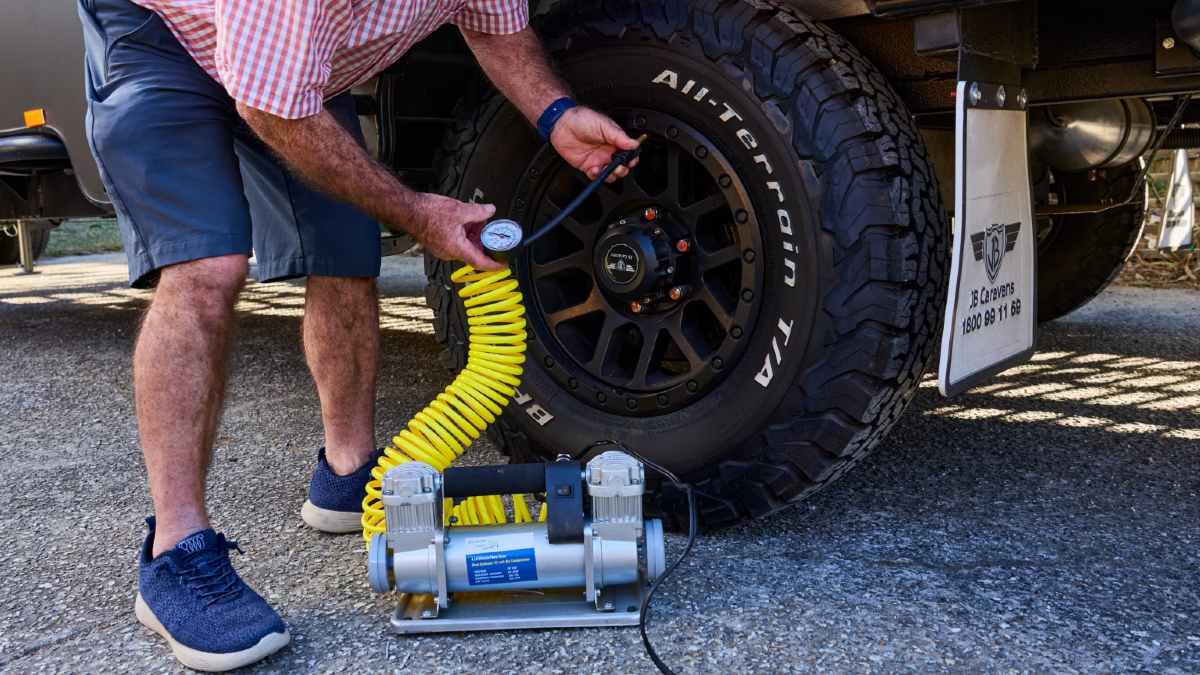 RACV ERA patrol changing tyre on car