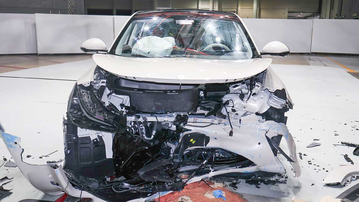 Extensively damaged front end of MG IM6 SUV after Euro NCAP frontal offset crash test.
