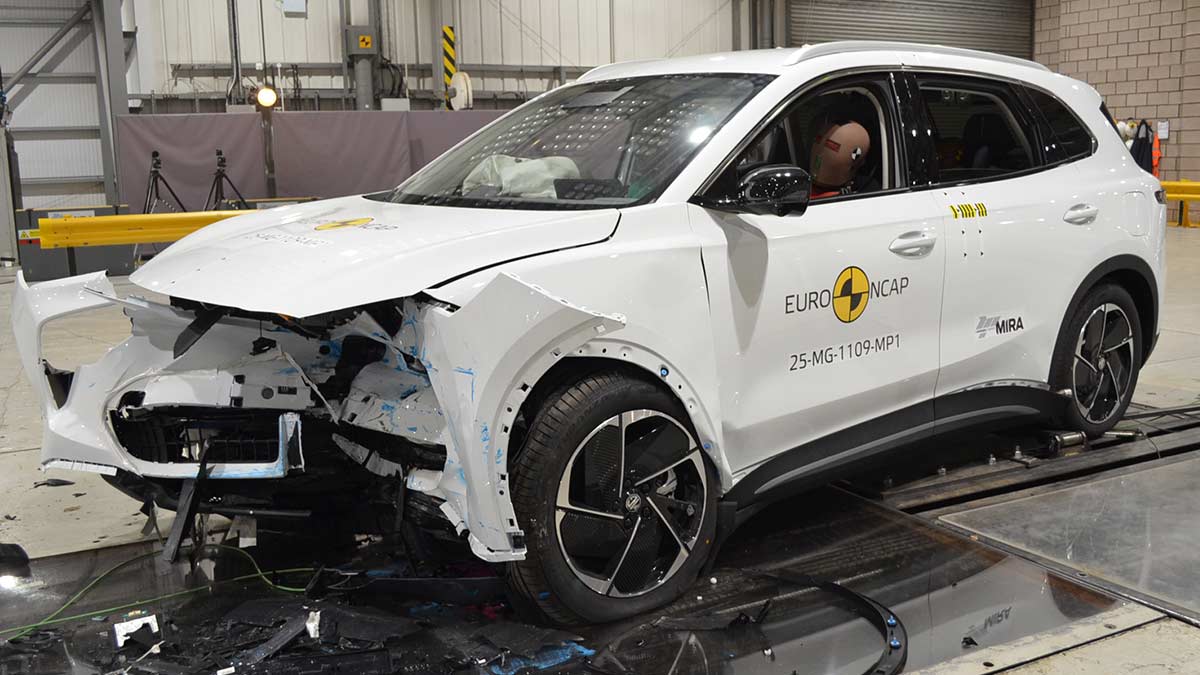 White MG S5 EV small SUV with heavily damaged front end after Euro NCAP frontal offset crash test.