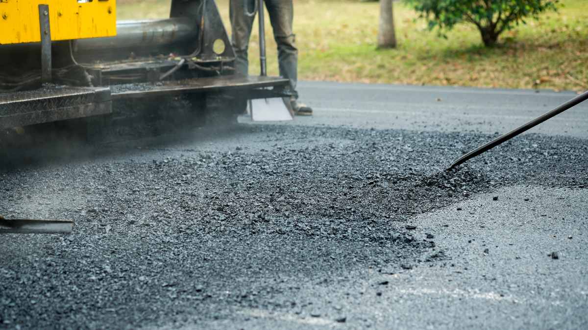 An asphalt road being fixed