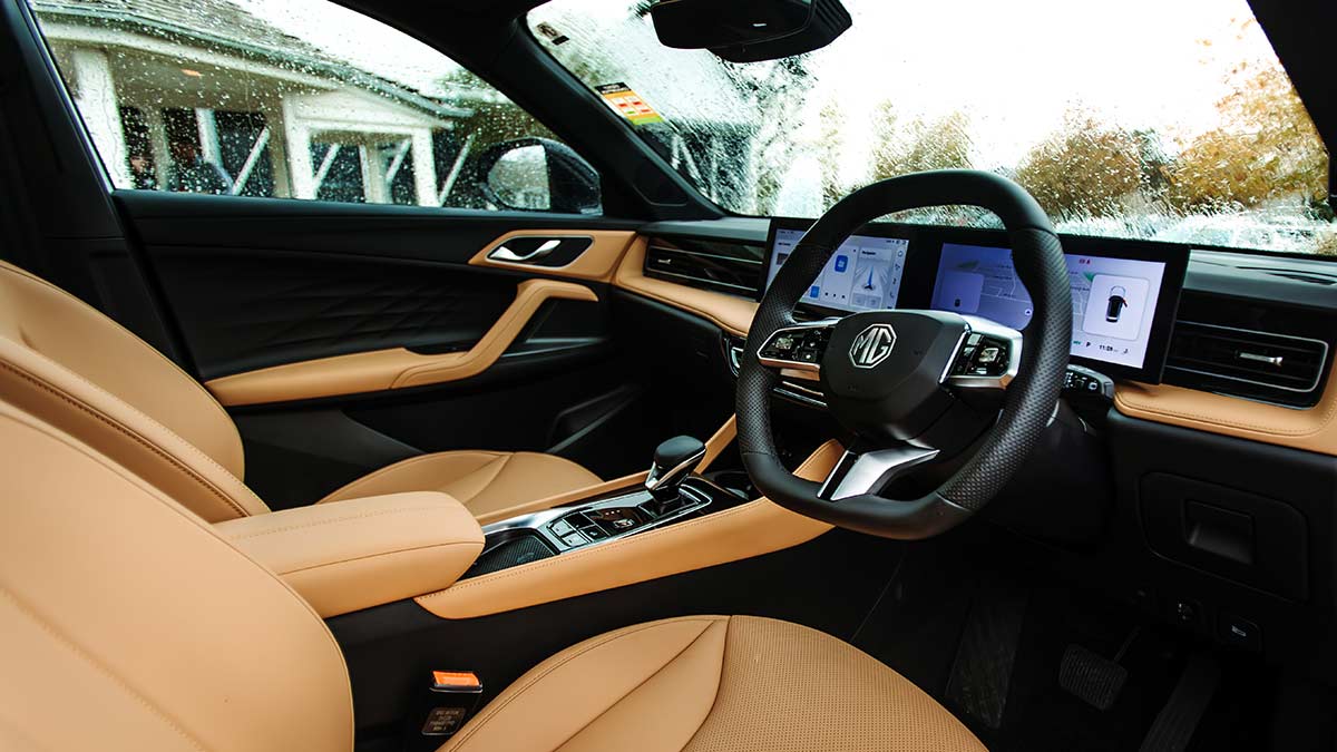Front compartment of MG HS Essence plug-in hybrid SUV with tan and black trim