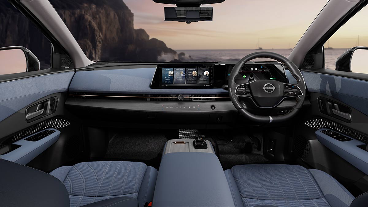 Grey trim across dash, doors, console and seats of Nissan Ariya medium electric SUV