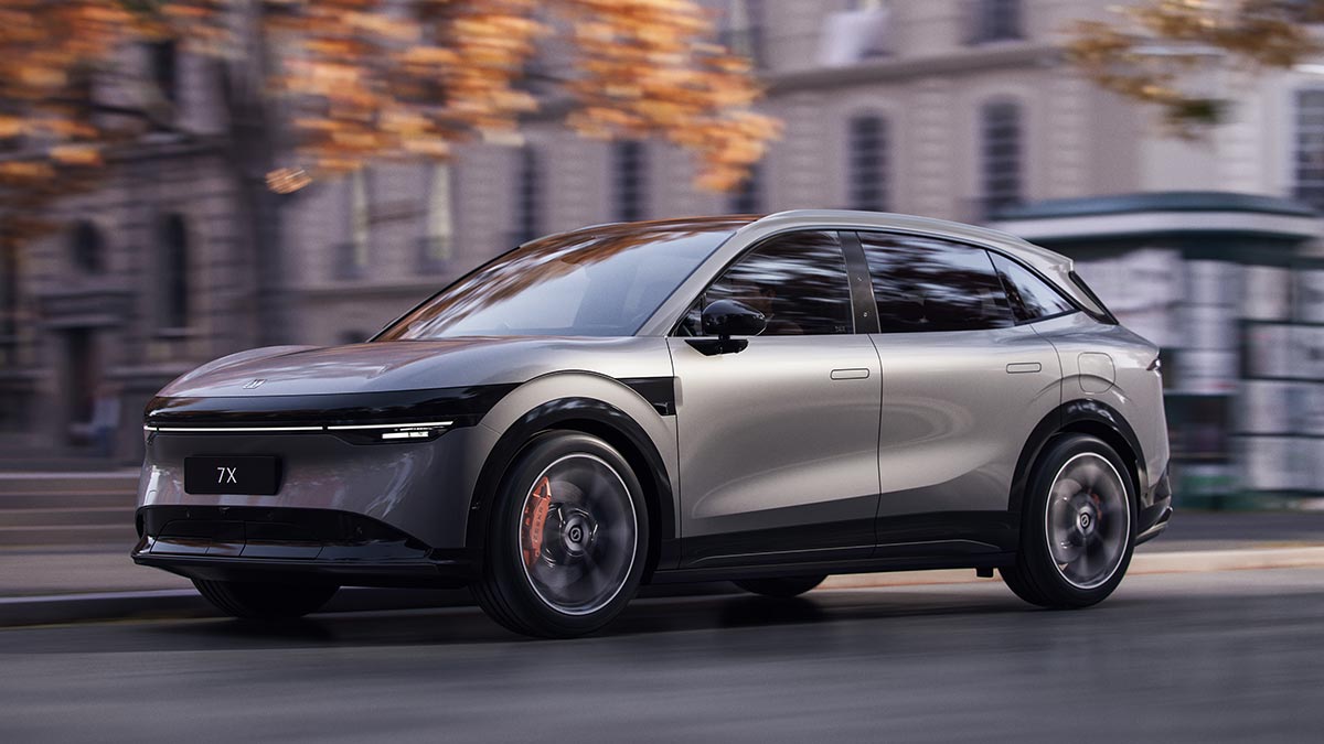 Zeekr 7X SUV in Tech Grey colour driving on tree-lined street in European city