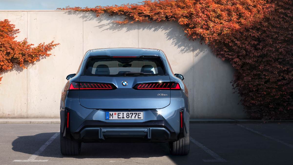 rear view of parked blue 2026 BMW iX3