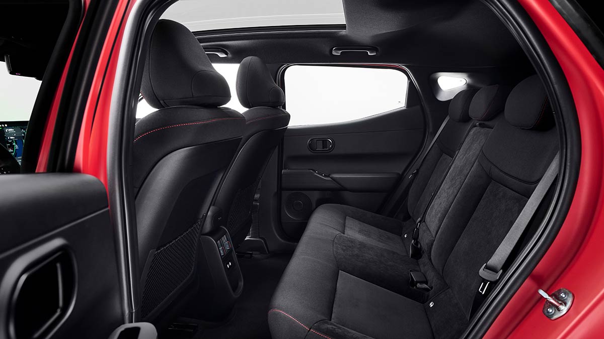 Red Hyundai Ioniq 3 electric vehicle rear seats.