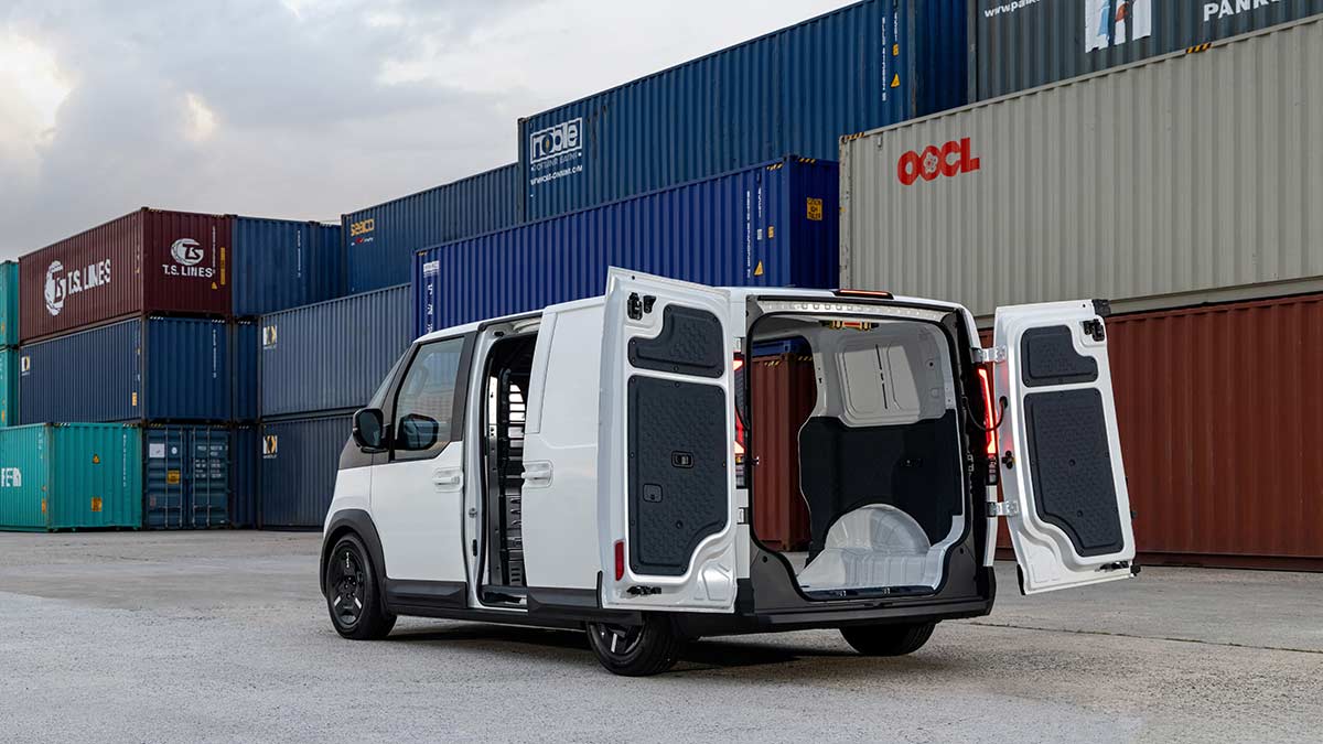 Rendered view of Kia PV5 van with vertical doors at back open.