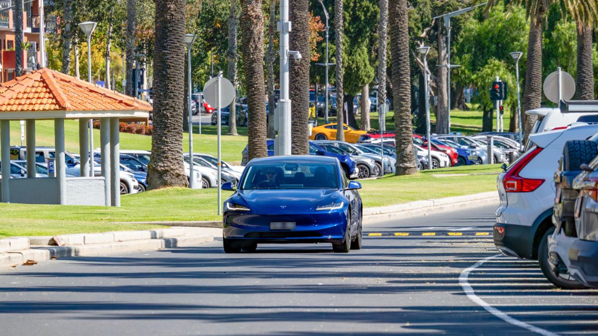 Tesla-Model-3-EV-Testing-driving-shot.jpg