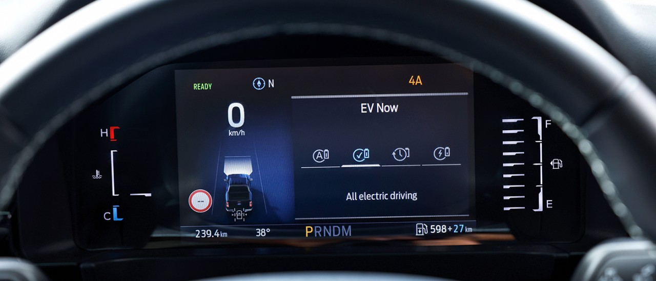 Driver’s digital instrument panel in Ford Ranger plug-in hybrid ute showing EV mode activated.