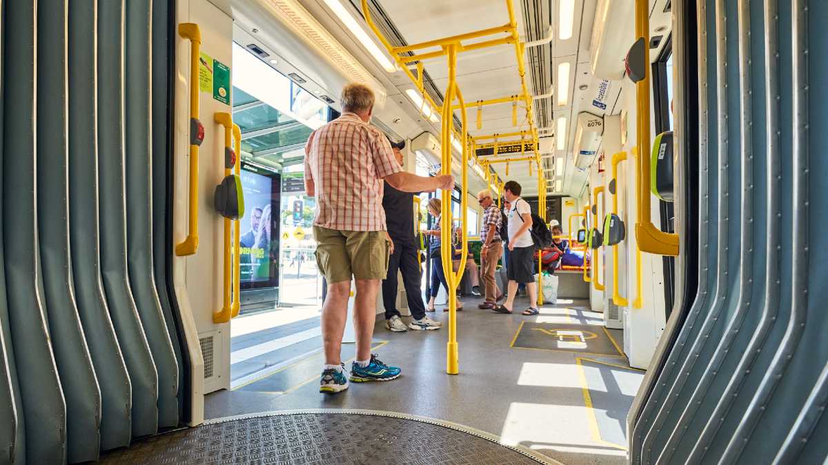 People standing inside a tram