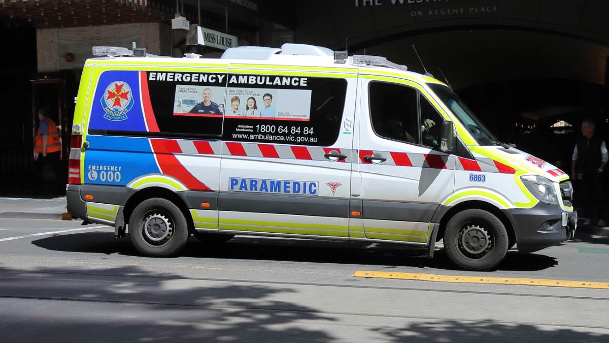 An Ambulance on Collins St, Melbourne