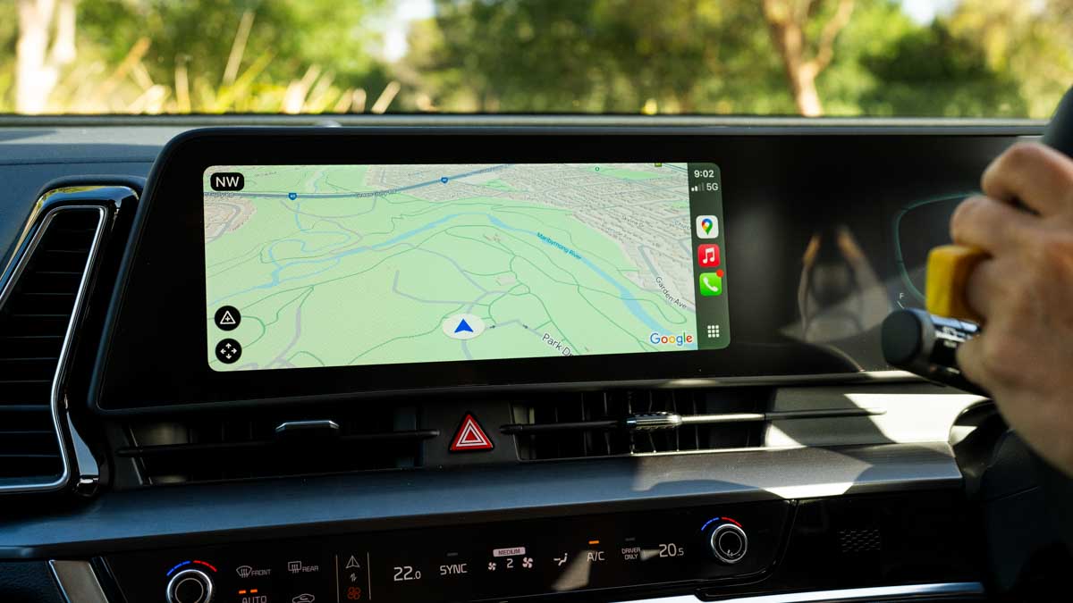 Apple CarPlay displayed on a car dash screen showing a navigation app