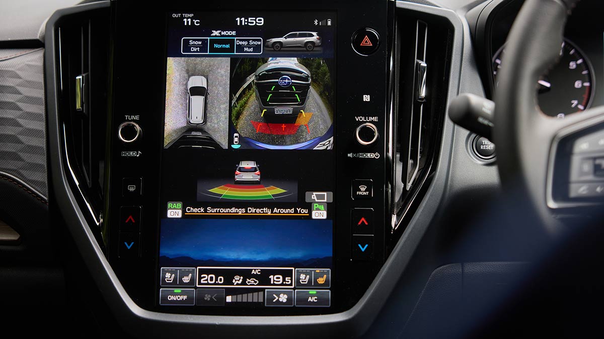2025 Subaru Forester SUV infotainment screen showing overhead and front camera views and rear object detection graphic