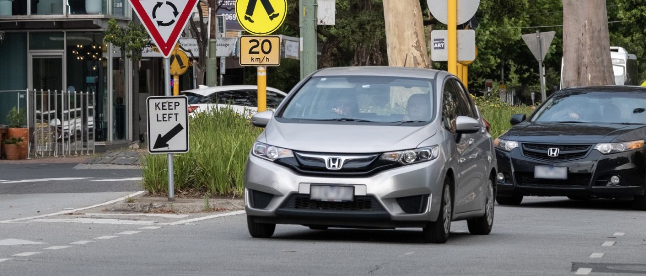 cars driving on city road