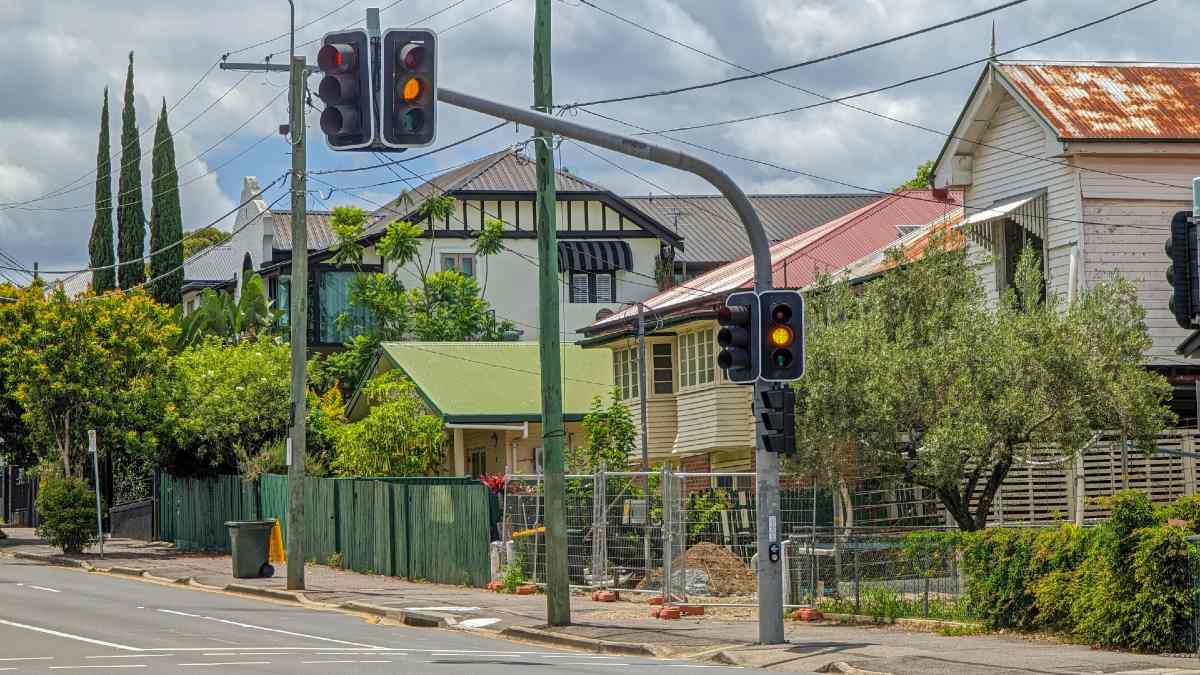 road in Australia with yellow traffic lights