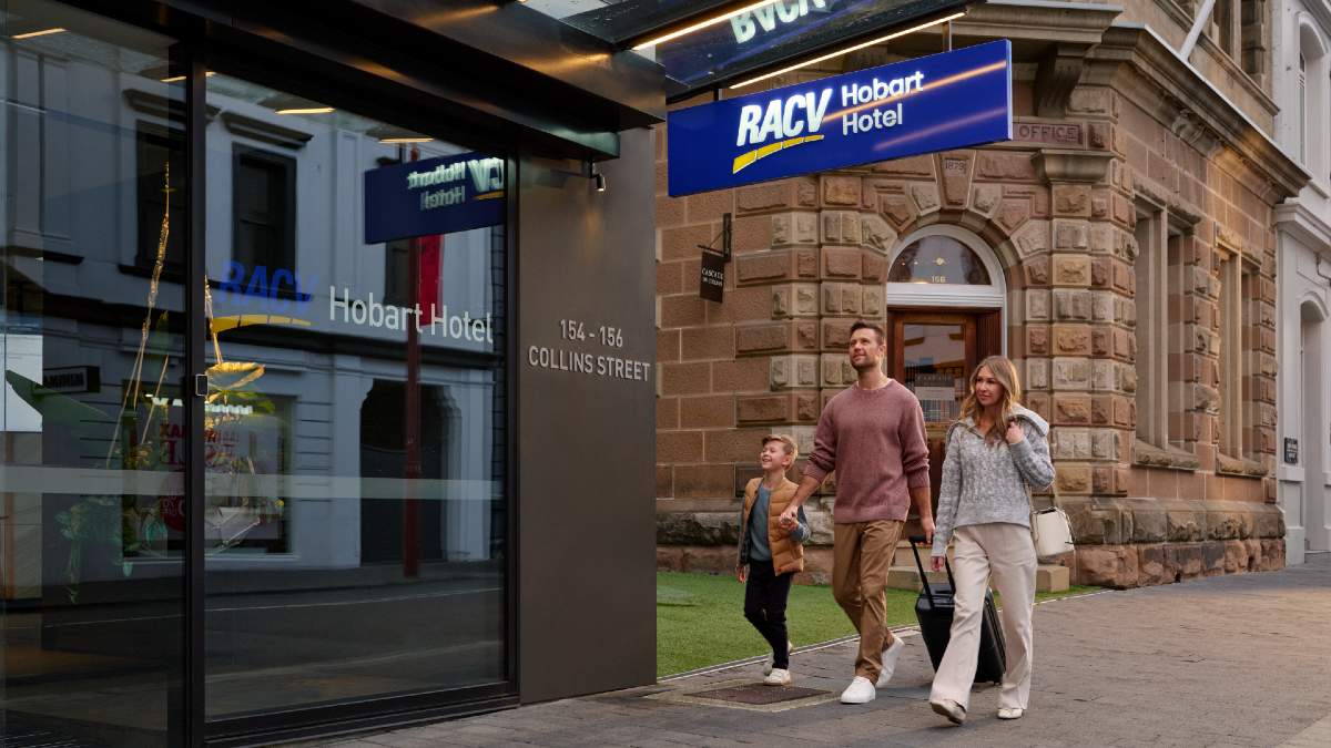 family walking into RACV Hobart Hotel