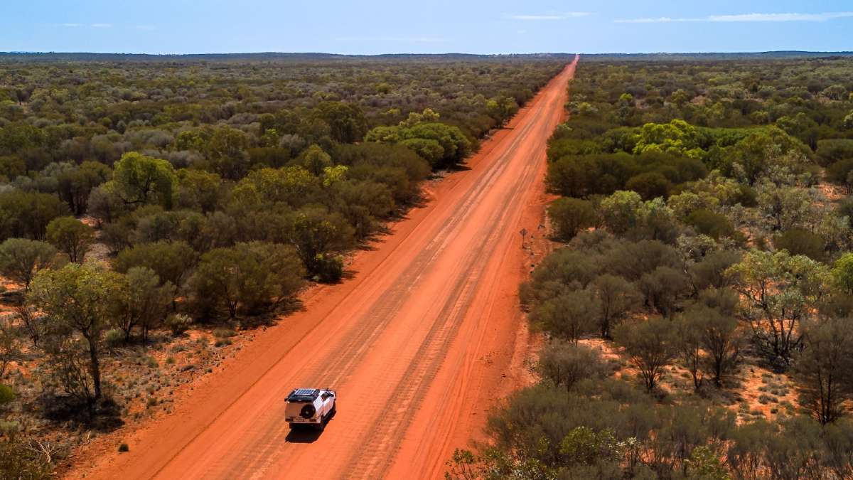 4WD on red dusty road in the outback