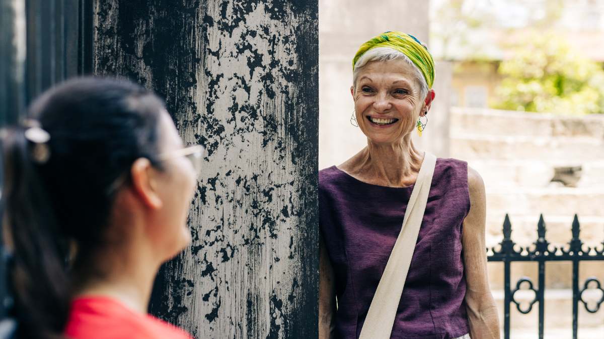 two woman smiling at each other in Hanoi