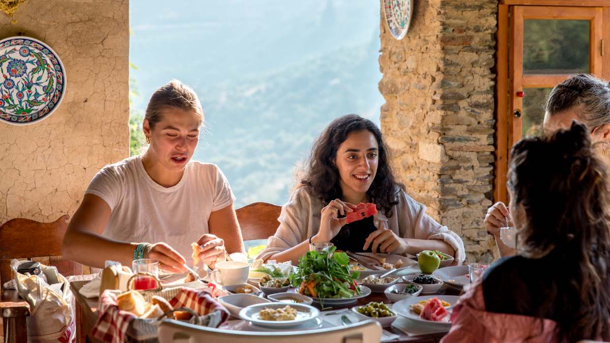 young women sharing a meal in a Turkish hotel