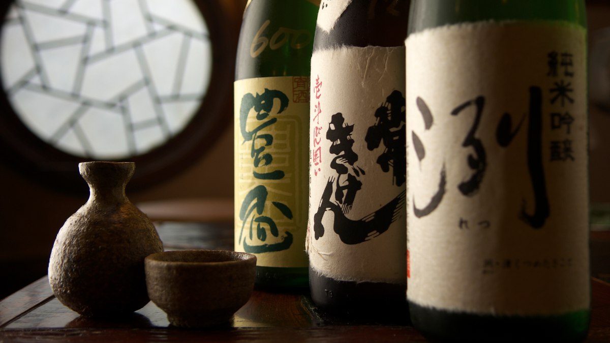 three Japanese drinks on a low table