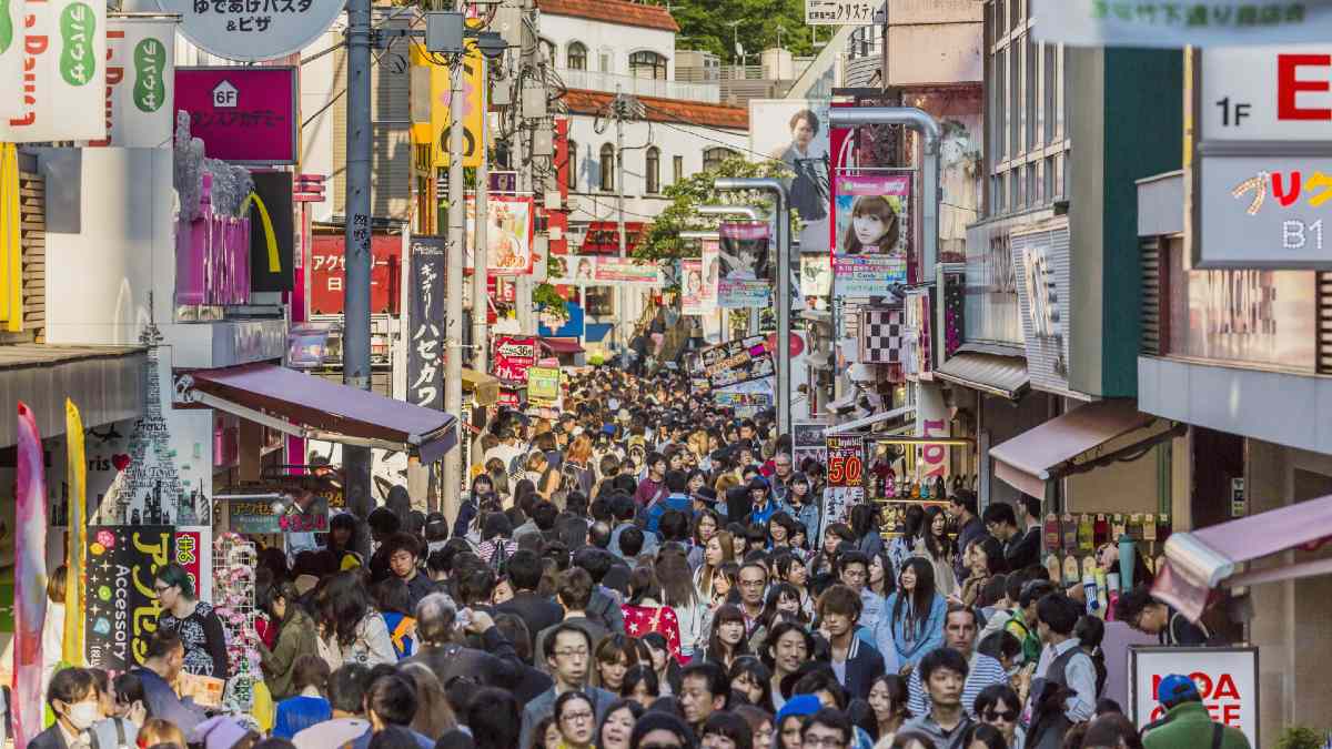 large crowd of people in Tokyo's Harajuku district
