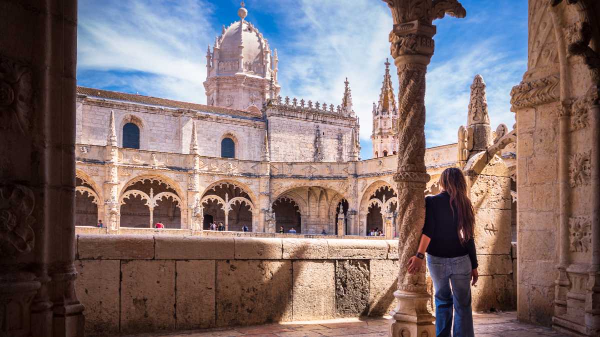 woman looking at a monastery