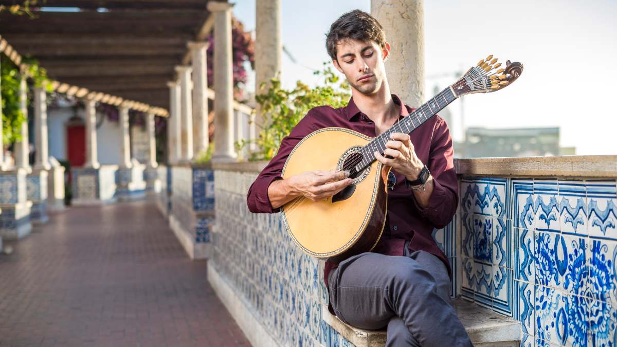 young man playing fado music