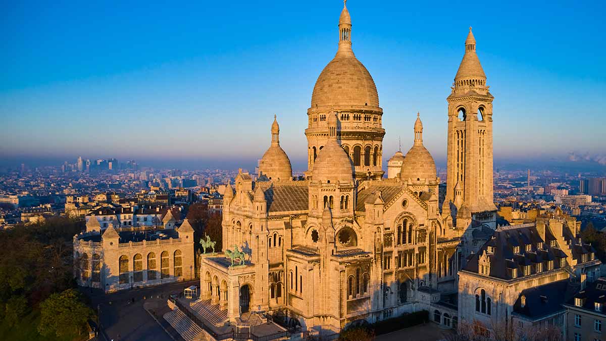 Sacre Couer Basilica at sunrise in Paris.