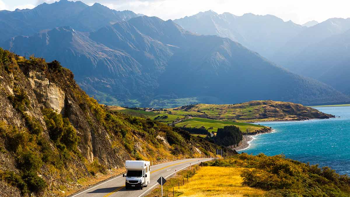 Campervan on Road by Lake Hawea near Wanaka in New Zealand