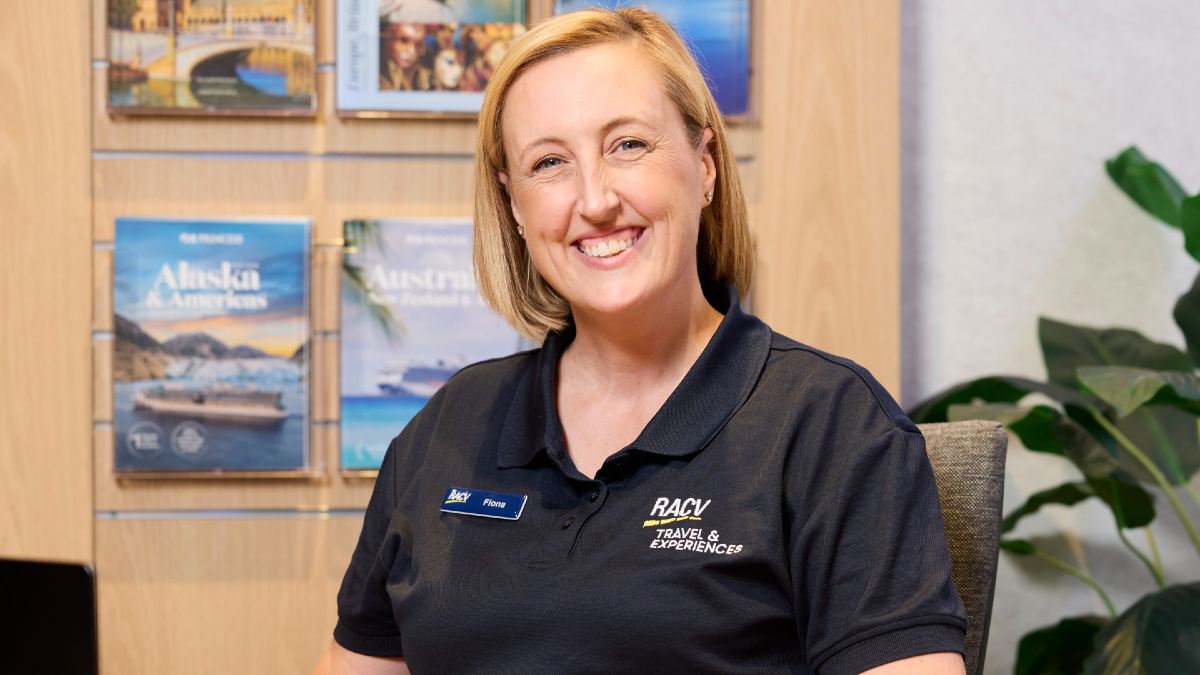 RACV travel agent smiling at camera