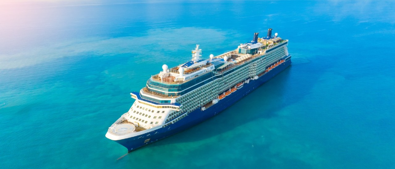 large cruise ship on beautiful blue ocean
