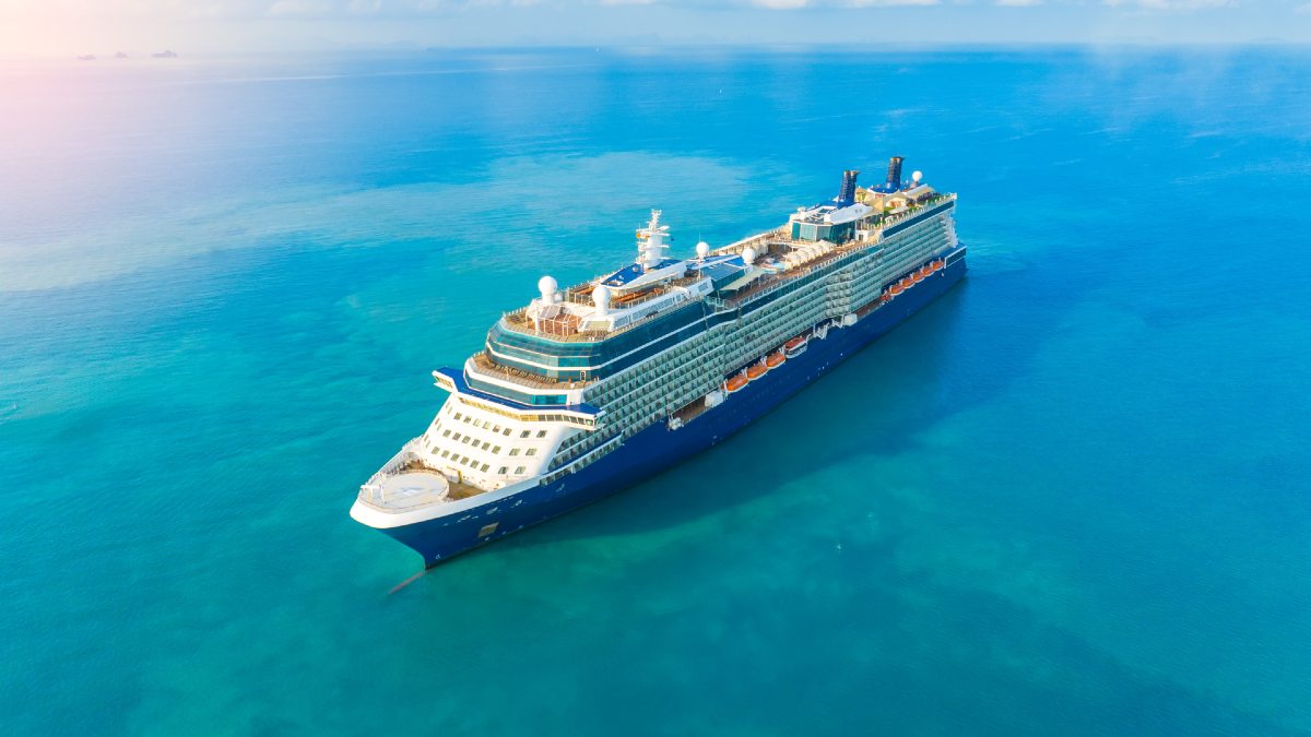 large cruise ship on beautiful blue ocean