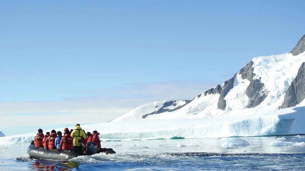 Tourists on a Zodiac boat in Antarctica.