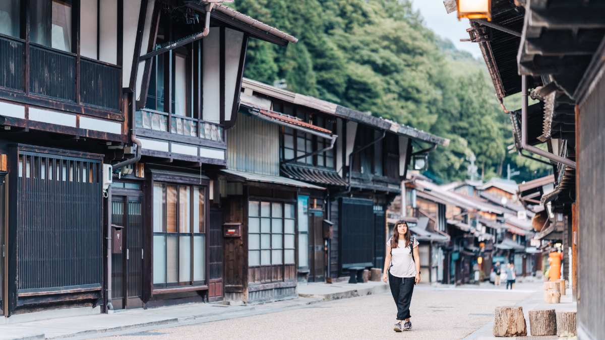 young woman walking in Edo-period post town