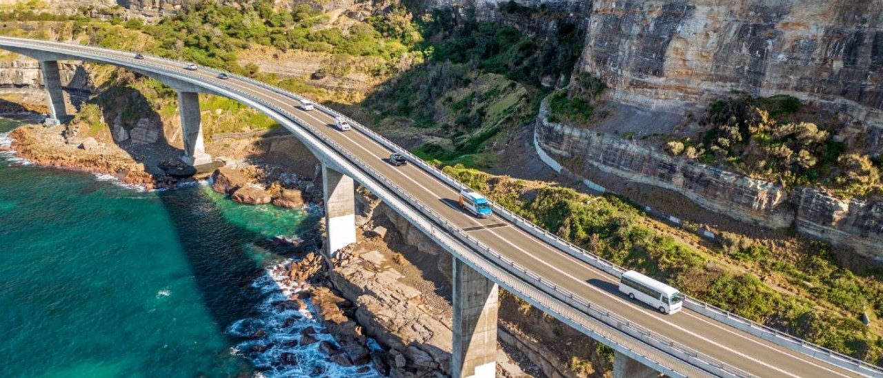 multiple cars driving on NSW's Sea Cliff Bridge