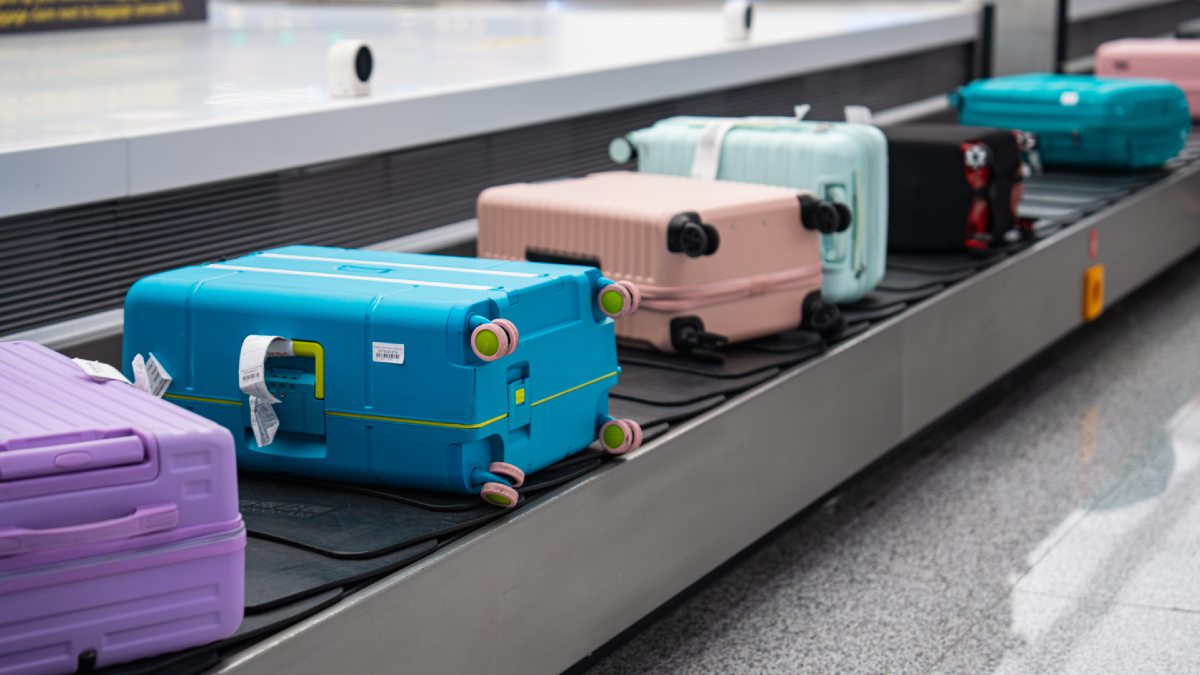 suitcases on an airport luggage carousel