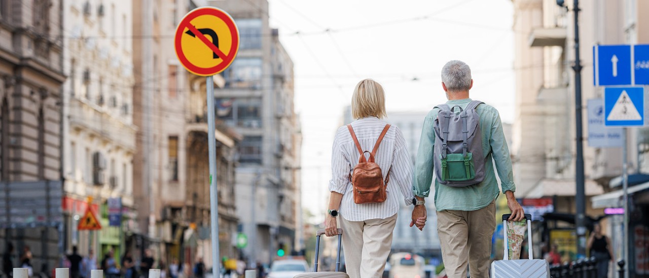 Couple walking down street in Serbia