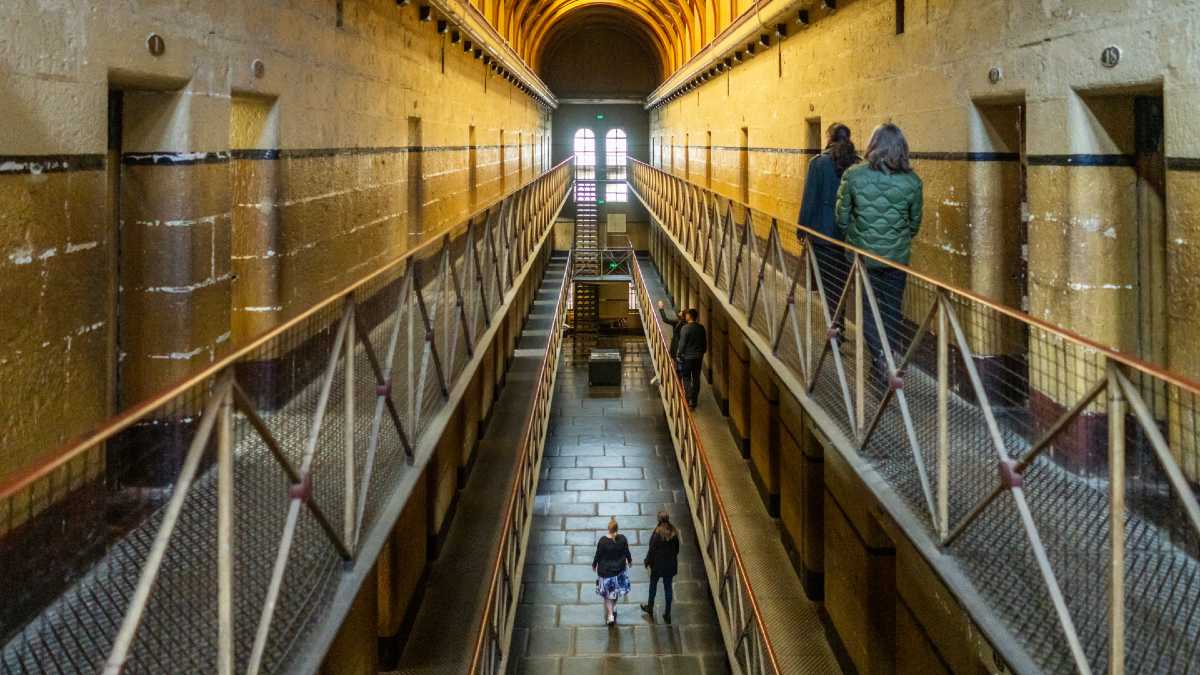 people wandering through historic jail