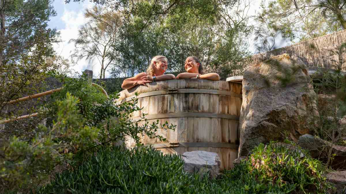 two women in a hot springs barrel