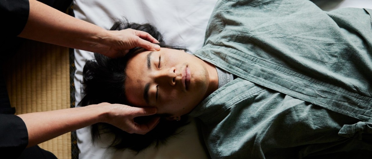 young man getting head massage