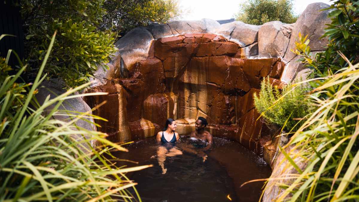 two people relaxing in a hot spring