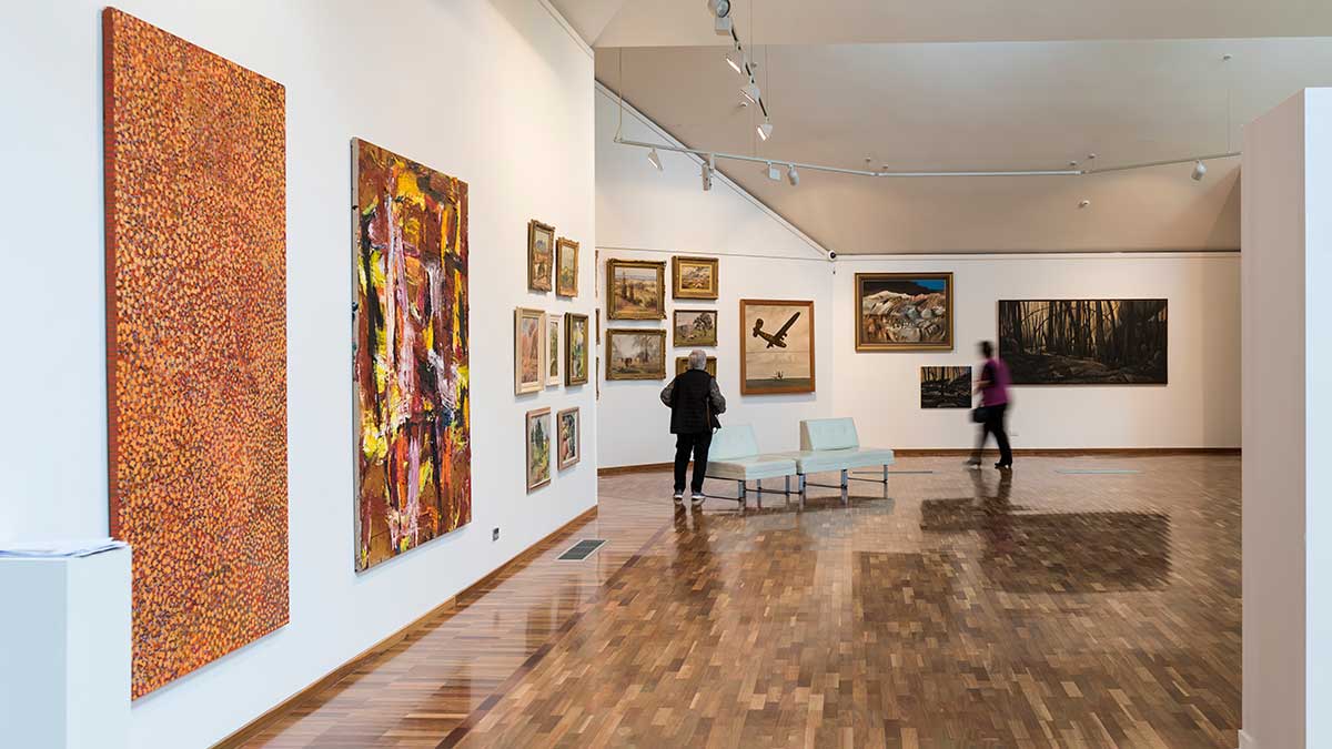 Two women in an art gallery