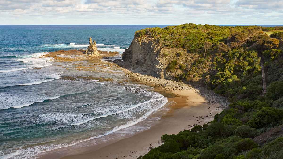 aerial shot of Eagles Nest rock formation on a coastline