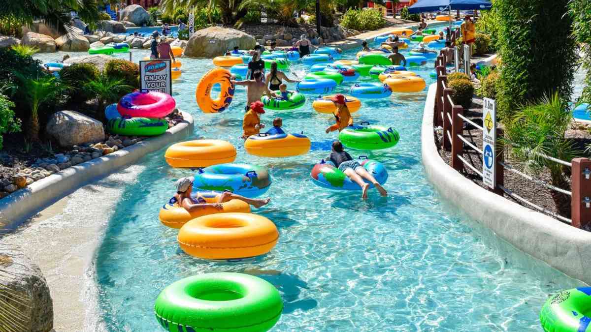 people floating on tubes in a lazy river