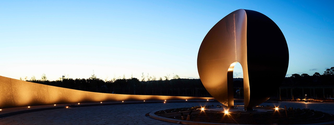 Art sculpture at Point Leo lit up at night