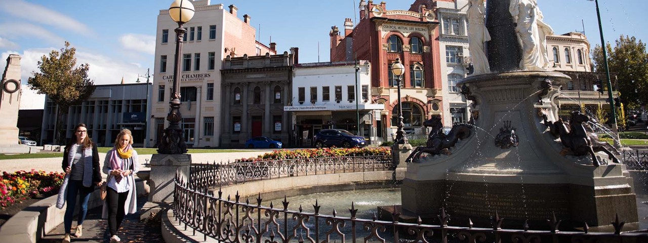 Regional town with old building and water fountain