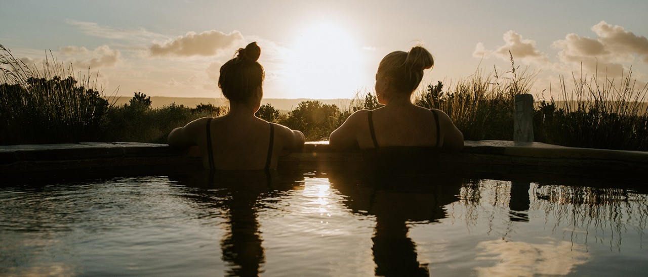 group of people bathing in a Peninsula Hot Springs pool